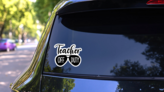 Teacher Off Duty Quote And Glasses Illustration Sticker on a Rear Car Window (New) example