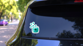 Teal Nail Polish Dots Sticker  on a Rear Car Window (New) example
