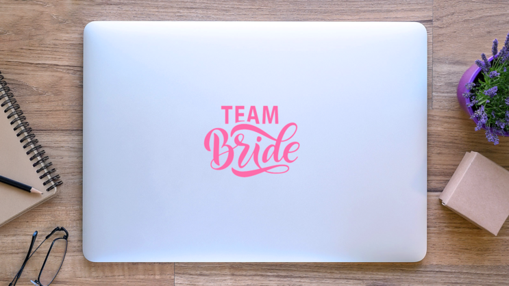 Team Bride Calligraphy Transfer Sticker on a Laptop (New) example