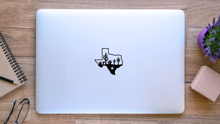 Texas Map Silhouette And Cactuses Desert Sticker on a Laptop (New) example