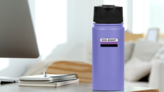 The Word Non-Binary Pride Flag Sticker on a Water Bottle (New) example