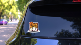 Think Outside the Box Fun Sticker on a Rear Car Window (New) example
