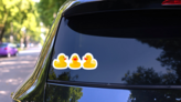 Three Rubber Ducks In A Row Sticker on a Rear Car Window (New) example