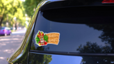 Tiki Tribal Wooden Mask And Tiki Bar Sign Sticker on a Rear Car Window (New) example