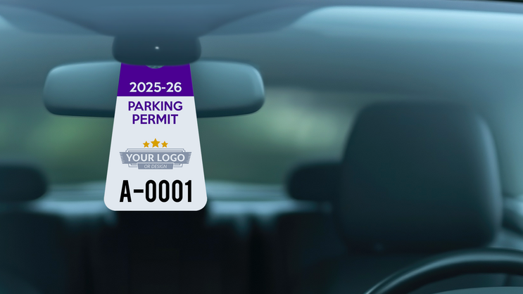 Customizable triangle parking permit hang tag hanging in windshield.