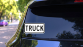 Truck Sign Sticker on a Rear Car Window (New) example