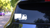 Trucking Service Sticker on a Rear Car Window (New) example
