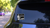 Try Our Delicious Bar-b-q - Retro Sticker on a Rear Car Window (New) example