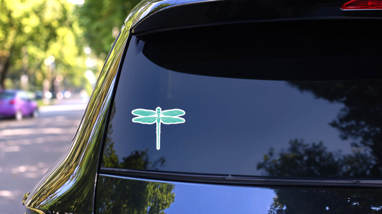 Turquoise Dragonfly Sticker on a Rear Car Window (New) example