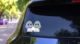 Two Cute Cartoon Baby Squids Squid Goals Sticker on a Rear Car Window (New) example
