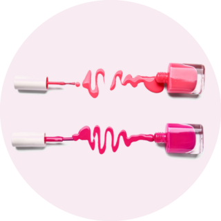 Two Overturned Bottles Of Pink Nail Polishes Sticker