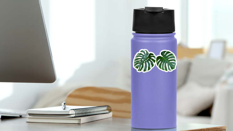 Two Tropical Jungle Monstera Leaves Sticker on a Water Bottle (New) example
