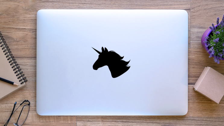 Unicorn Head Silhouette Sticker on a Laptop (New) example