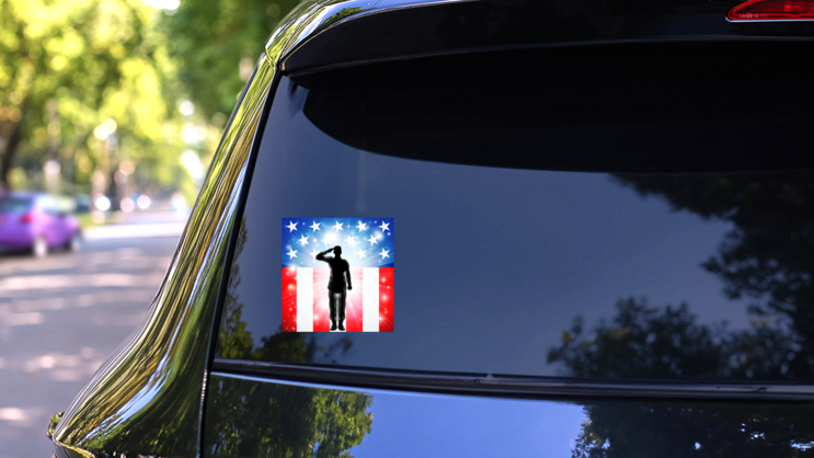 US Soldier Saluting In Front Of An American Flag Sticker on a Rear Car Window (New) example