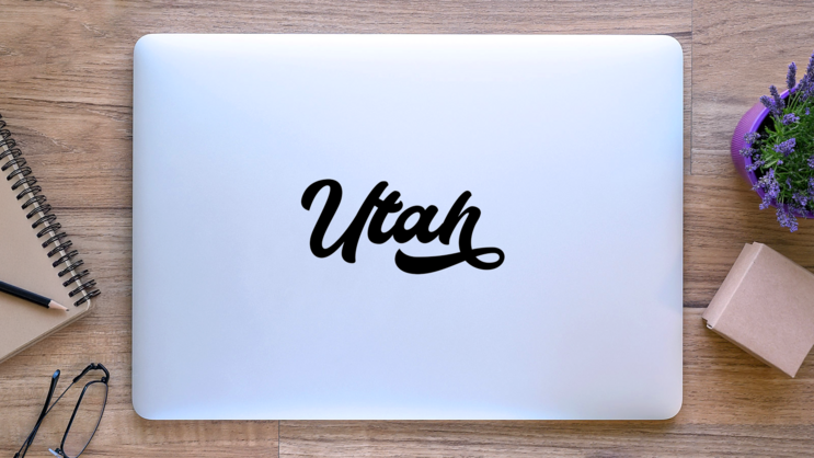 Utah Calligraphy Text Sticker on a Laptop (New) example
