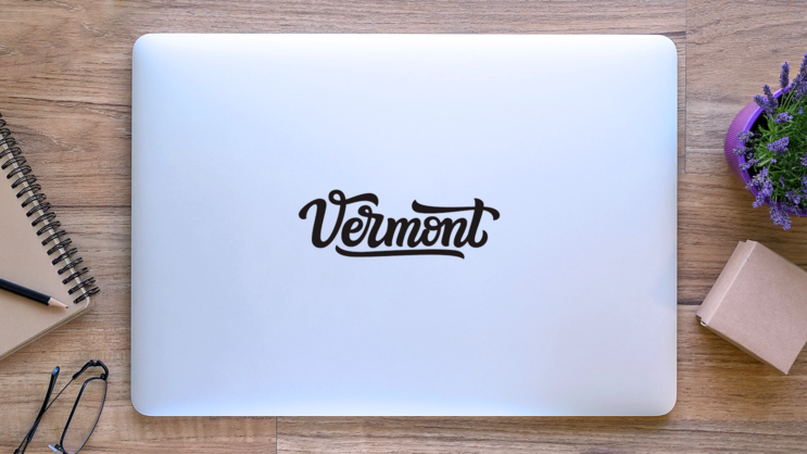 Vermont Calligraphy Sticker on a Laptop (New) example