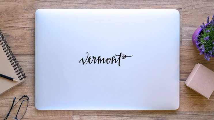 Vermont Curly Script Sticker on a Laptop (New) example