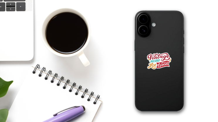 Vintage Means Preloved Thrift Lettering Sticker on a Phone (New) example
