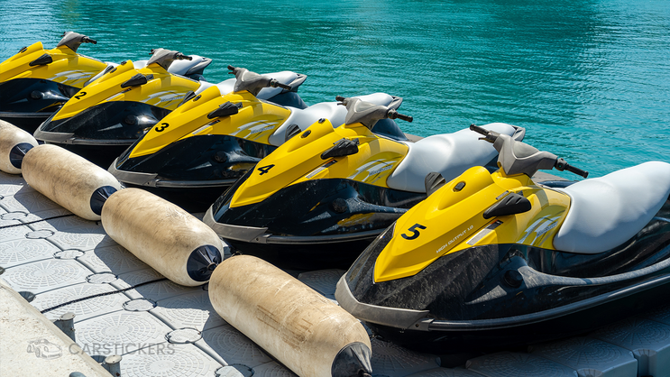 A series of vinyl numbering decals on jet ski rentals.