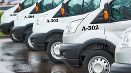 Vinyl numbering on a line of fleet vehicles