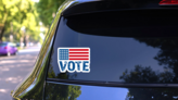 Vote 2020 On American Flag Sticker on a Rear Car Window (New) example