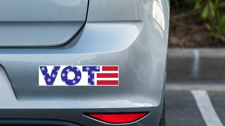VOTE USA Themed Bumper Sticker on a Grey Car Bumper example