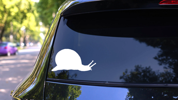 Wandering Snail Sticker on a Rear Car Window (New) example