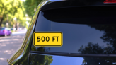 Warning 500 Feet Sticker on a Rear Car Window (New) example