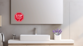 Wash Your Hands Stop Sign Sticker on a Bathroom Mirror (New) example