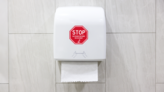 Wash Your Hands Stop Sign Sticker on a Paper Towel Holder (New) example