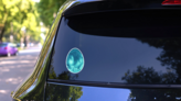 Watercolor Blue Easter Egg Closeup Sticker on a Rear Car Window (New) example