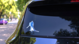 Watercolor Cross-country Skiing Sticker on a Rear Car Window (New) example