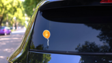 Watercolor Golden Balloon Sticker on a Rear Car Window (New) example