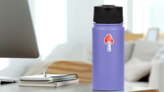 Watercolor Red Amanita Mushroom Sticker on a Water Bottle (New) example