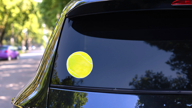 Watercolor Tennis Ball Illustration Sticker on a Rear Car Window (New) example