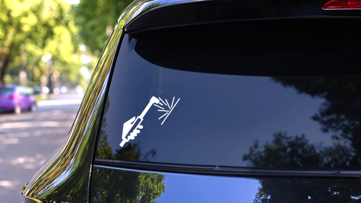 Welding Sticker on a Rear Car Window (New) example
