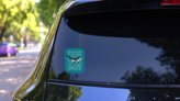 Whale On The Background Of Wind Rose And Old Map In Retro Style on a Rear Car Window (New) example