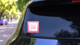 White and Pink Painted Breast Cancer Awareness Month Sticker on a Rear Car Window (New) example