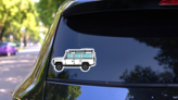 White Off Road Vehicle with Racks Sticker on a Rear Car Window (New) example