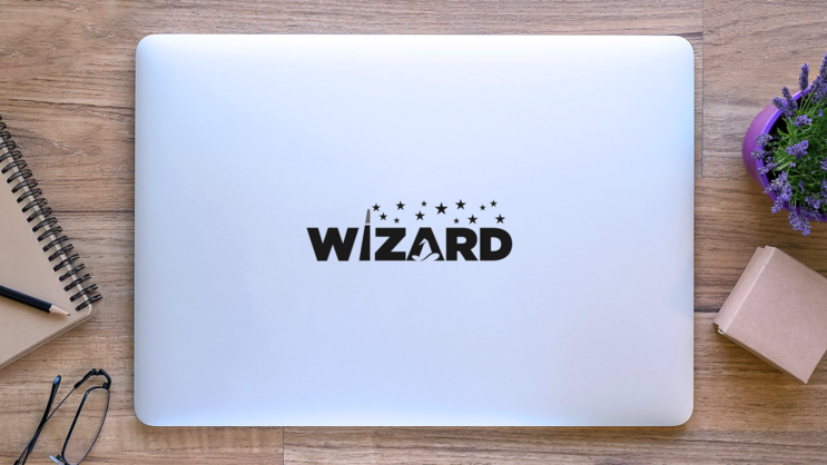 Wizard Hat And Stars Text Sticker on a Laptop (New) example