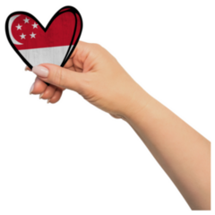 Woman Hand Is Holding Singapore Heart Sticker
