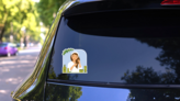 Woman Using Cannabis Oil Hair Products Sticker on a Rear Car Window (New) example