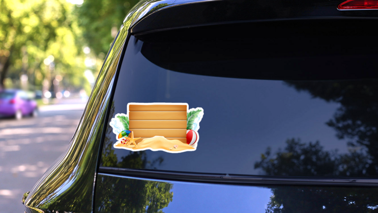 Wooden Sign On The Beach Sticker on a Rear Car Window (New) example