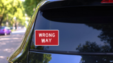 Wrong Way Sticker on a Rear Car Window (New) example