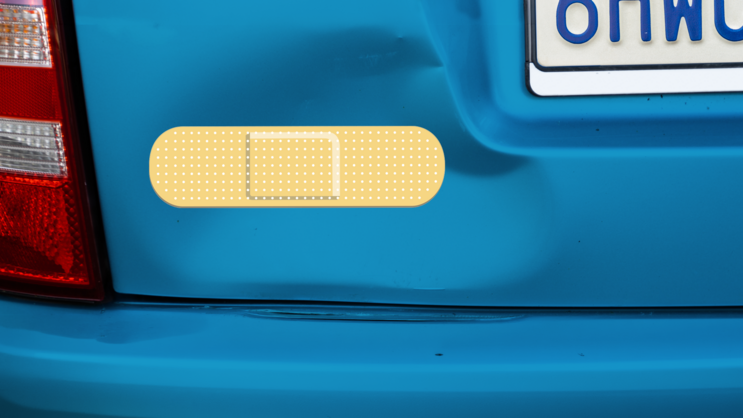 Yellow Band Aid Bandage Sticker on a Dented Car example