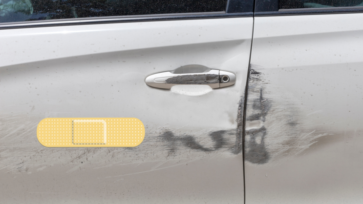 Yellow Band Aid Bandage Sticker on a Scratched Car example