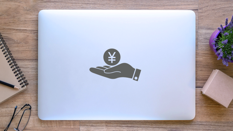 Yen In Hand Sticker on a Laptop (New) example