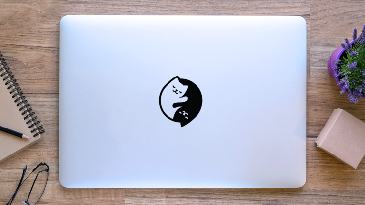 Yin Yang Cats Sticker on a Laptop (New) example