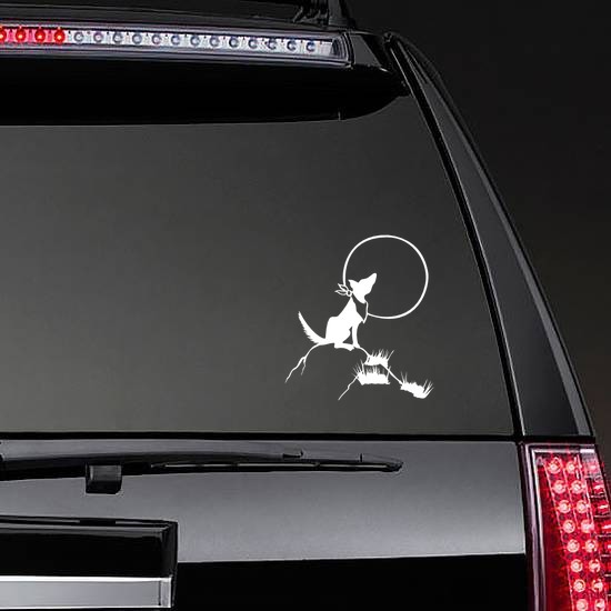 Wolf Coyote Howling At The Moon Sticker on a Rear Car Window example