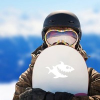 A Smiling Shark Sticker on a Snowboard example